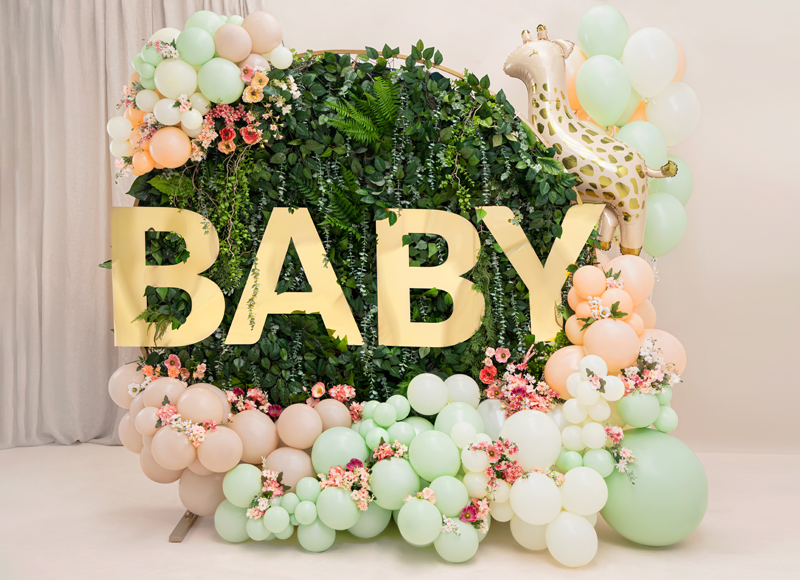 baby-shower, balloon-decor, giraffe-balloon, pastel-balloons, floral-wall